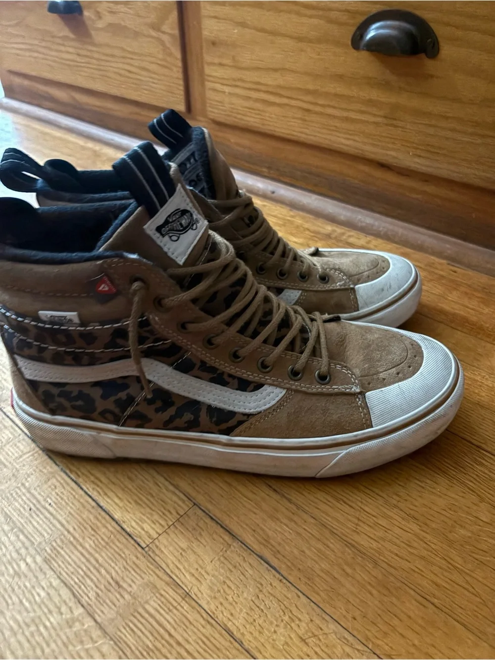 Vans Women's High-Top Winter Boots in Brown and White or a men’s 9.5